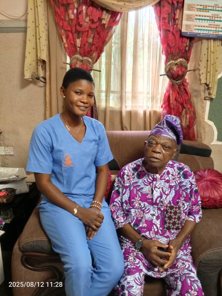 Older people and care team members together in the care home