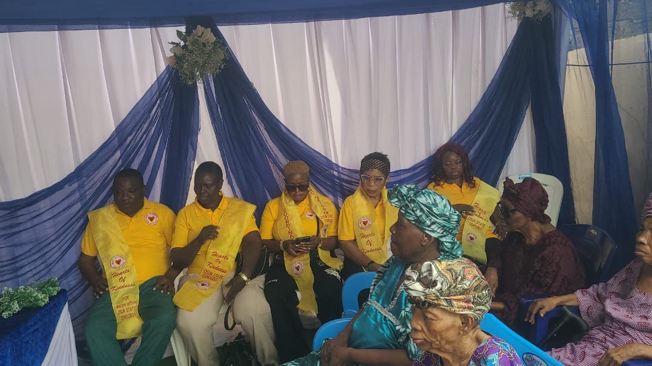 Older people and Grace community members seated together at a gathering